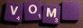 [SCRABBLE tile Style #M51W-T, Plum Crazy Purple tile with white letter, Textured]