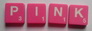 [SCRABBLE tile Style #M80W-T, Pink tile with white letter, Textured]